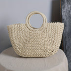 Ibiza | Bolso en forma de media luna de paja trenzada
