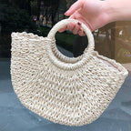 Ibiza | Bolso en forma de media luna de paja trenzada