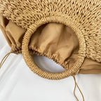 Ibiza | Bolso en forma de media luna de paja trenzada